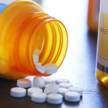 Close Up Of Pills Pouring Out Of A Prescription Medication Bottle; Image credit: Getty Images